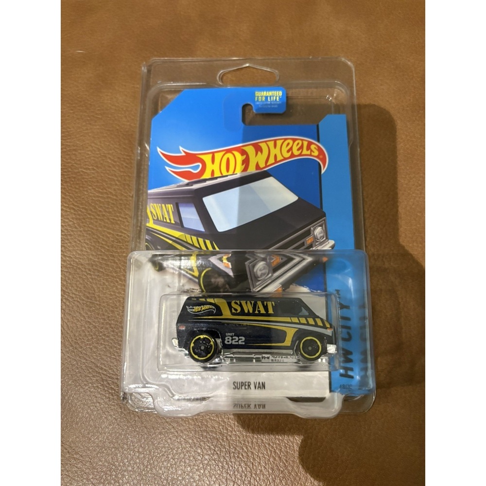 Hot Wheels Super Van SWAT. 2013. Ships in protector.